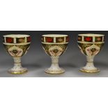 Three Royal Crown Derby 1128 pattern goblets,