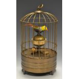 A reproduction automaton, birds in a bird cage.