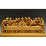 A carved wooden figural group - The Last Supper.