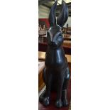 A large bronzed metal figure, of a seated hare,