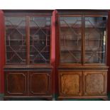 A matched pair of 'George III' mahogany library bookcases,