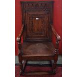 A 17th century style oak Wainscot chair,