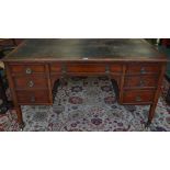 An Edwardian mahogany writing desk,