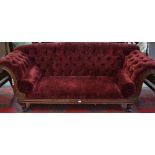 A William IV rosewood scroll end sofa, deep buttoned stuffed over upholstery,