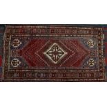 An Iranian hand knotted carpet,