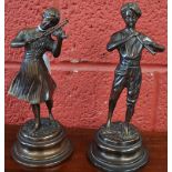 A pair of bronzed figures, musicians,