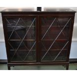 An early 20th century mahogany glazed bookcase