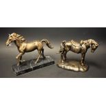 A cast metal model of a trotting horse, marble base; another, standing,