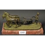 A bronzed figure, of a ploughman and a pair of horses, marble base, approx 22.