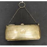 A George V silver evening purse, engine turned,