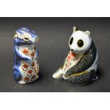 A Royal Crown Derby paperweight, Panda, gold stopper; another, Koala, gold stopper; another,
