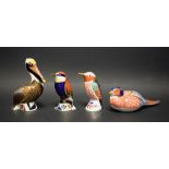 A Royal Crown Derby paperweight, Brown Pelican; another, Bee-Eater; others, Hummingbird,