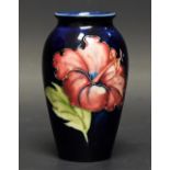 A Moorcroft Hibiscus pattern vase, 10.