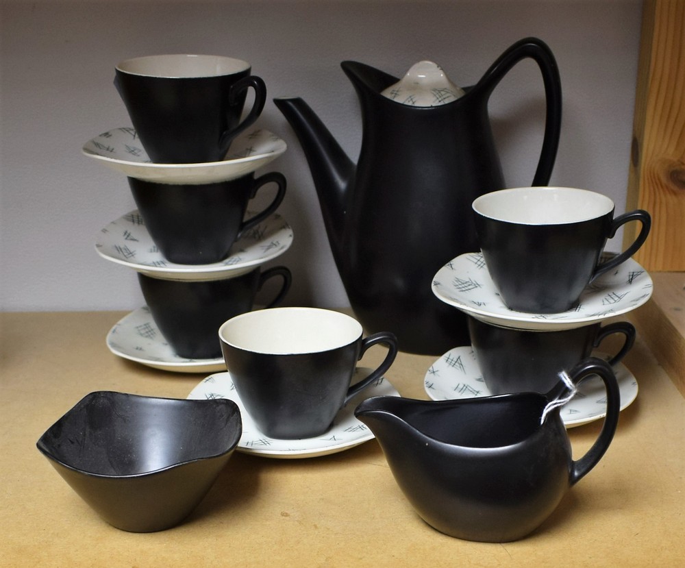 A Midwinter Monaco coffee set for six comprising coffee pot, cream jug, sugar bowls,