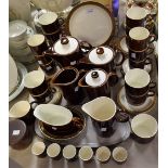 A Poole pottery breakfast service, comprising plates, side plates, oval serving platter,