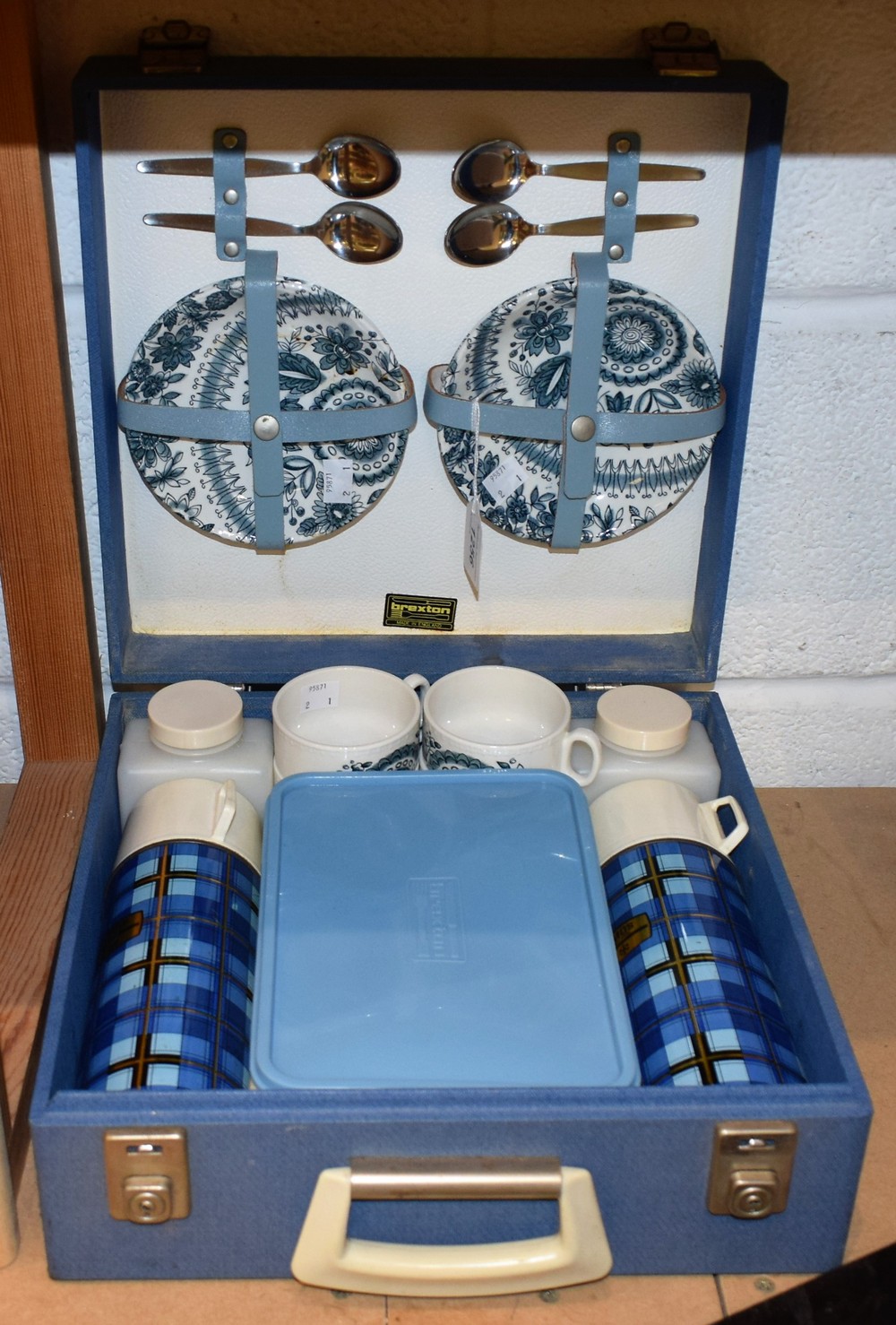 A Brexton picnic hamper, fitted with cups, saucers, water bottles, teaspoons,