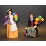 A Royal Doulton ceramic figure, Balloon Lady, HN2935; another, The Balloon Man,