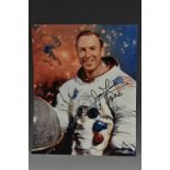 An autographed photographic image of astronaut Jim Lovell of the Apollo 13 mission,