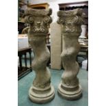 Pair of stone effect medium sized resin spiral pedestals.