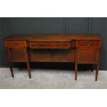 A George III period, late 18th / early 19th century breakfront sideboard / server on eight
