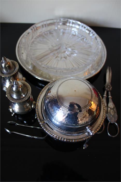 Silver plated items to include a hammered butter dish of sphere form with hinged lid and glass