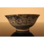 A Chinese blue and white porcelain bowl, painted in underglaze blue with abstracted decoration on