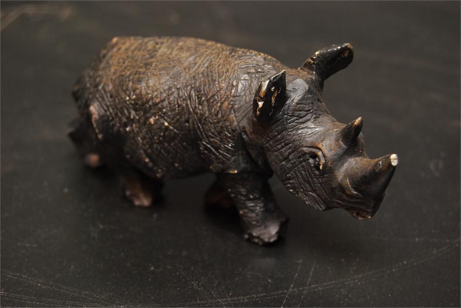 Cold painted metal possibly spelter figure of a Rhino / Rhinoceros. 14cm long, 6.5cm high