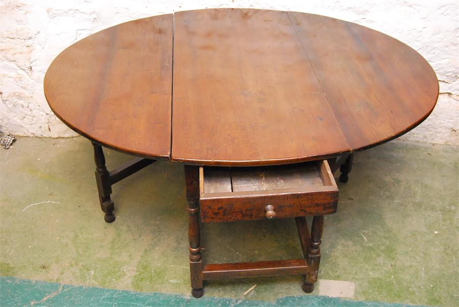 Oak gateleg oval table - 18th century elements - six seater.