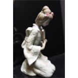 An unmarked oriental style porcelain figurine.