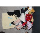 Quantity of vintage fabric/textiles to include vintage gloves, stockings, baby blanket, children’s