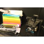 A Polariod Colorpack II land camera with type 668 filmpack