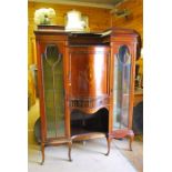 A fine quality glazed mahogany and boxwood or satinwood swag inlaid display cabinet with bow front