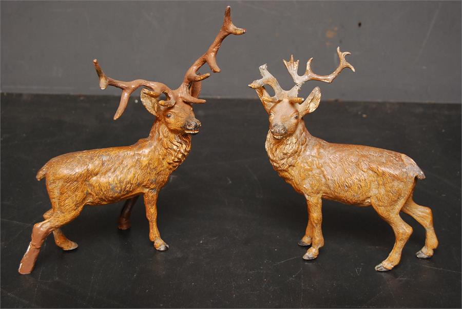 Two spelter stags with damage and repairs - cold painted