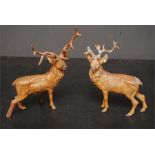 Two spelter stags with damage and repairs - cold painted