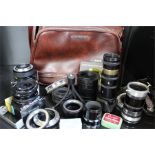 A Quantity of camera lens adapters, extender tubes in Olympus bag. Includes Fotodiox M42 - M4/3,