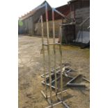 Two sets of chrome clothes rails of square form plus parts.