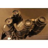 Two pairs of binocular, A Set of International 10 X 50 field 5 degrees and a set of military