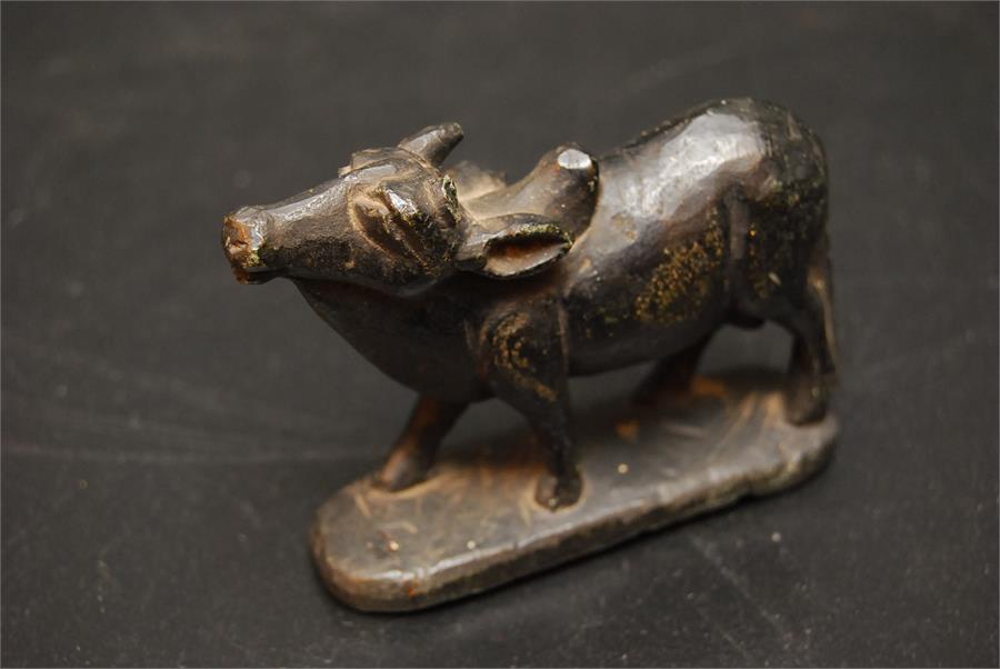 Indian Metal possibly Bronze / bronzed/spelter figure of a primitive sacred cow - possibly 17th /