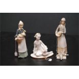 Two GDA Limoges? Nao / Lladro style figures / figurines. One with female feeding birds, another
