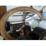 LARGE OVAL WOOD FRAMED BEVELLED EDGE MIRROR