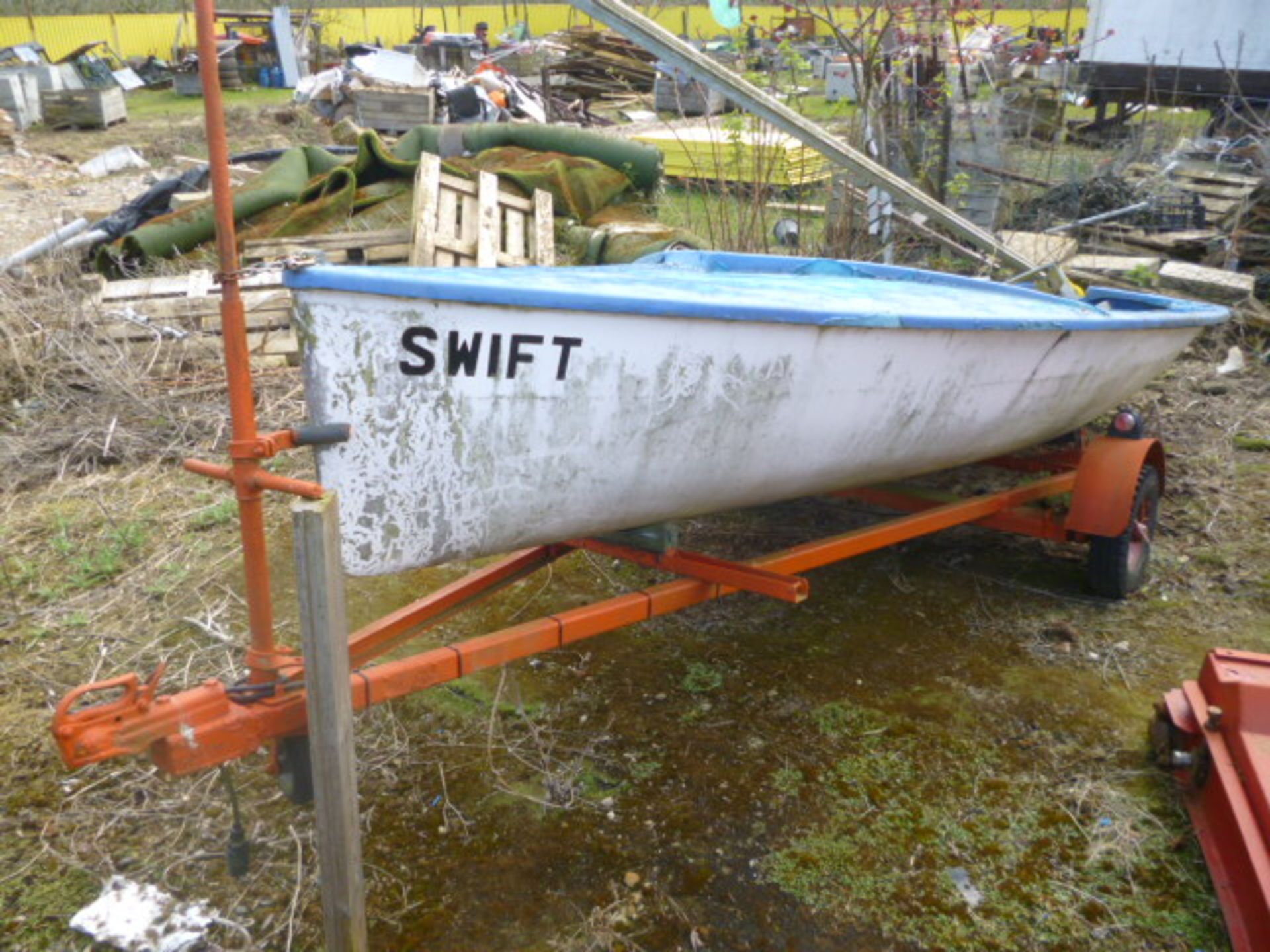 BOAT SWIFT SAIL OUTBOAT AND TRAILER