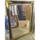 LARGE BLACK AND GOLD FRAMED MIRROR