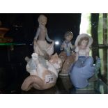 4 FIGURES ONE LLADRO AND 3 LLADRO NAO.