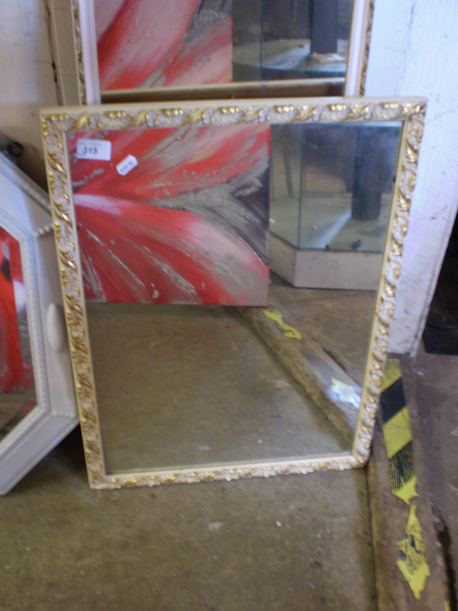 OBLONG WHITE AND GILT FRAMED MIRROR (46 X 62 CM)