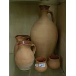 5 UNGLAZED POTTED JARS AND JUGS (LARGE ITEM IS 38 CM)
