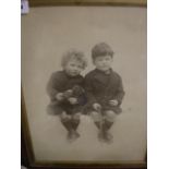 VINTAGE BLACK AND WHITE PHOTOGRAPH OF 2 BOYS SITTING (39 X 37 CM)