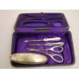 VANITY SET WITH 2 STERLING SILVER HANDLED ITEMS