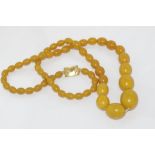 Vintage bakelite graduated yellow bead necklace