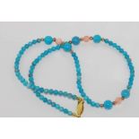 Stone set necklace in pink & blue colours