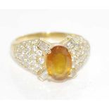 18ct yellow gold, orange sapphire & diamond ring